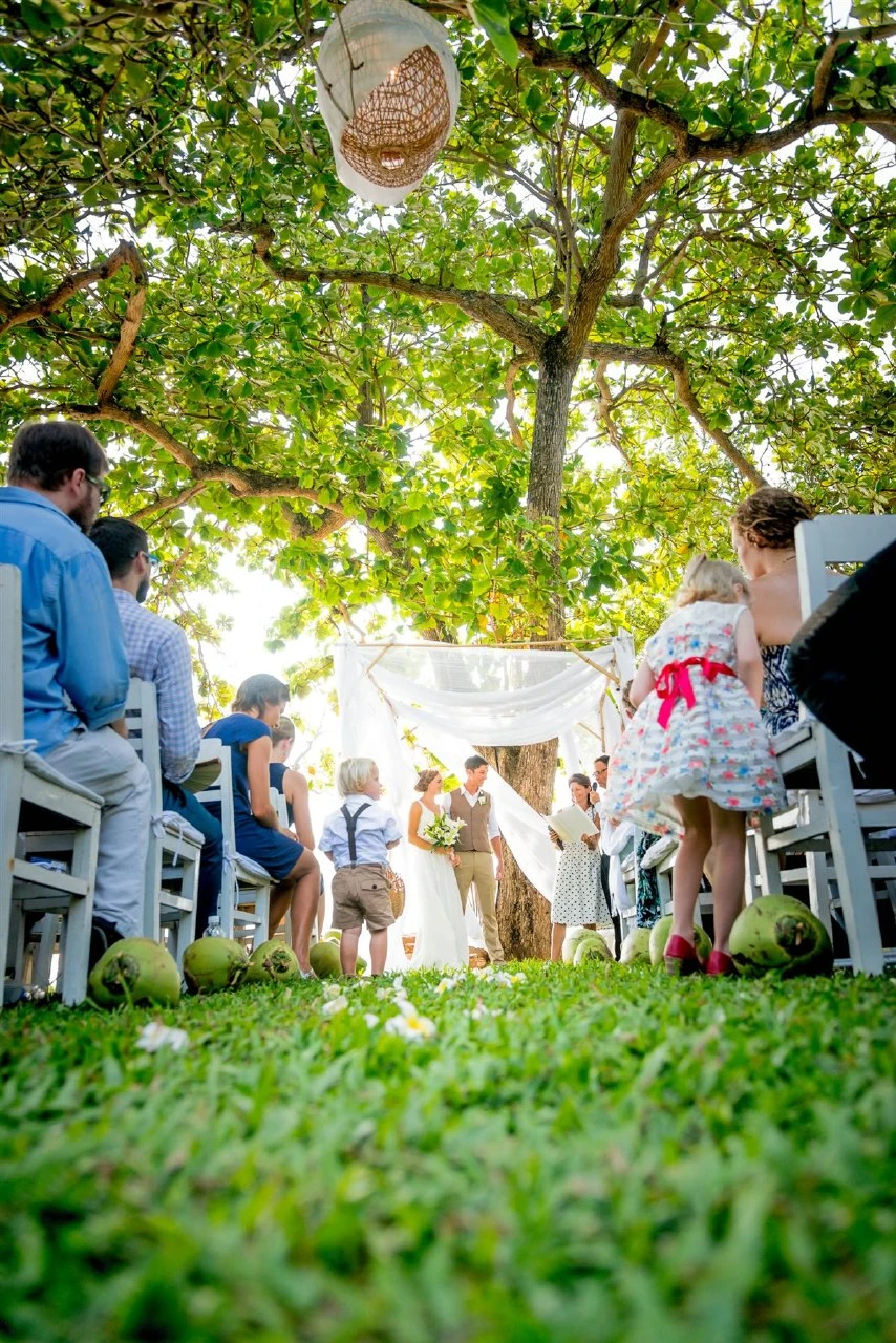 Garden ceremony under a tree at Knai Bang Chatt